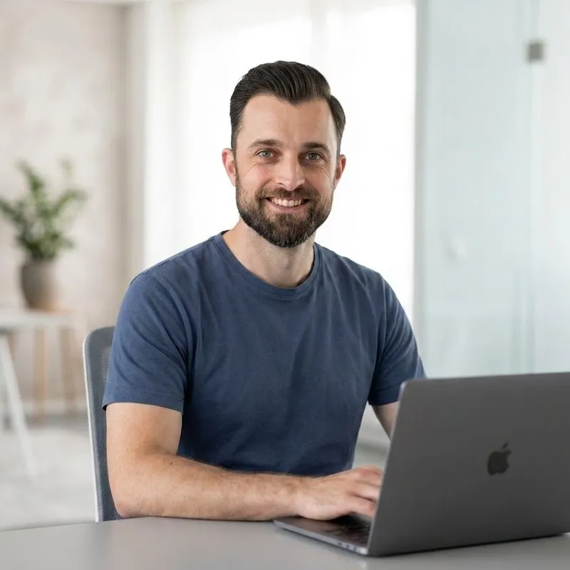 Steve at his desk with a laptop