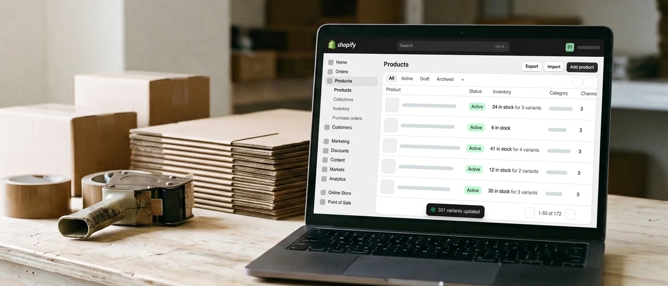 A packing bench with plain parcels and a laptop showing a re-created Shopify products list with made-up data